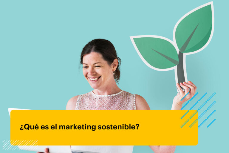 mujer sosteniendo un icono de planta y usando una laptop